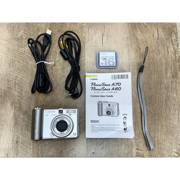 Canon Powershot A70 *PARTS ONLY* 3.2MP Digital Camera PC1043 + Manual & Cords - Picture 1 of 8